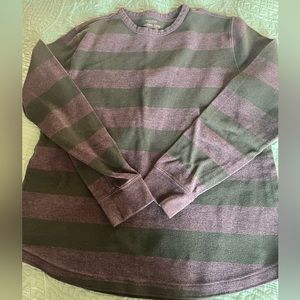 green and grey stripped thermal shirt